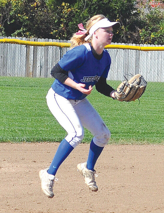 Abi Chipps goes airborne during the 2016 state softball tournament.
